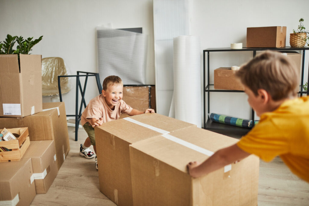 kids playing with boxes